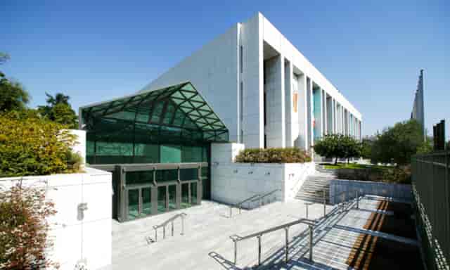 Modern Megaron Athens meeting hall entrance featuring a grand staircase for events and conferences.