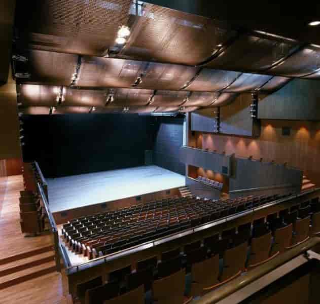 Tiered proscenium theater at Megaron Athens for corporate keynotes and professional presentations.