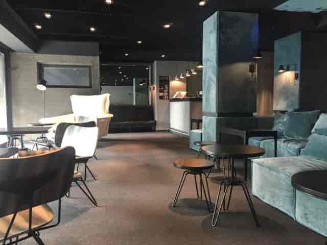 Modern breakout lounge for VIP networking and professional client consultations.