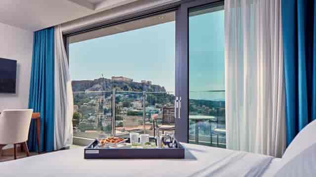 VIP suite at Electra Metropolis Athens featuring premier Acropolis views for corporate event hosting.