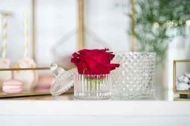 Elegant tablescape with floral centerpiece at Ploes Venue for gala or corporate event.