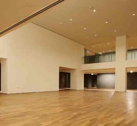 Ngee Ann Kongsi Auditorium, modern space with wood flooring for events in Singapore.