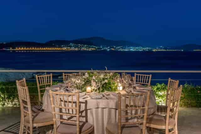 Outdoor waterfront wedding venue at Island Art & Taste with elegant Chiavari chairs.