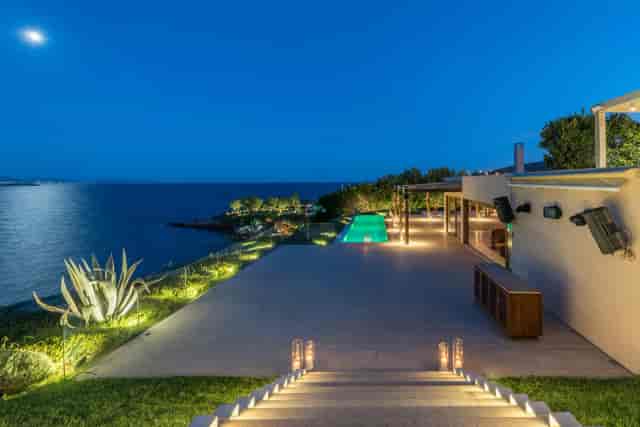 Luxury coastal event venue with infinity pool for exclusive receptions and gala dinners.