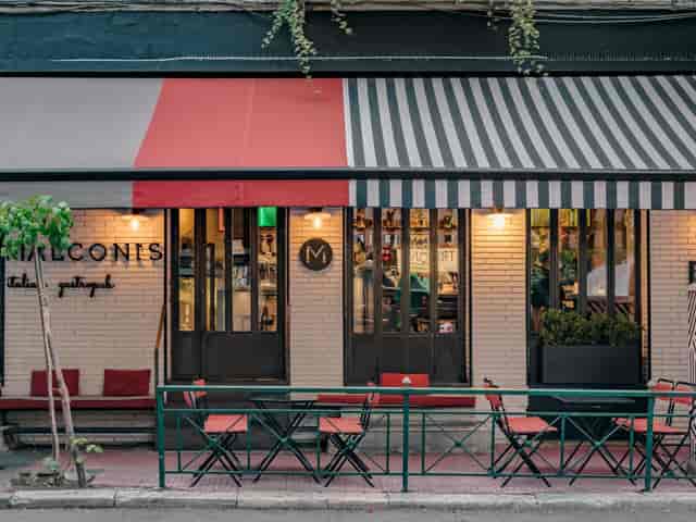 By the Bar at Malconi's: intimate event space for networking mixers and private client dinners.