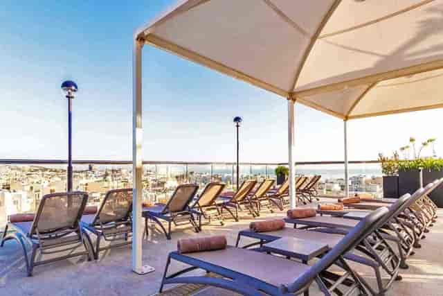 It-Terazzin pool deck rooftop venue with sunset views for corporate networking and events.