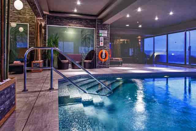 It-Terazzin pool deck at Victoria Hotel, luxury wellness space for corporate retreats and events.