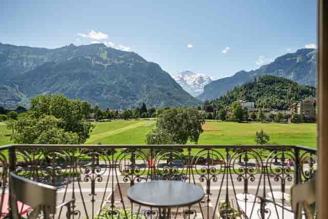 Bar with mountain views at Victoria-Jungfrau Grand Hotel for executive retreats and VIP events.