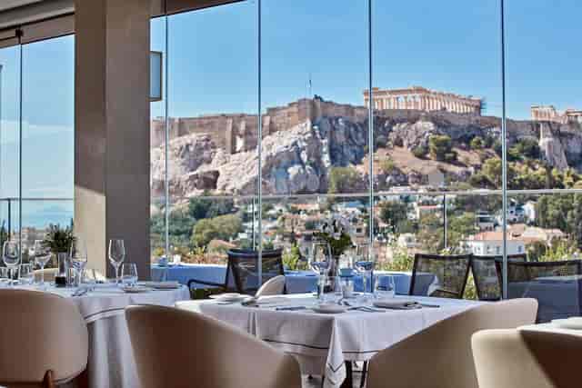 M Bar restaurant with Acropolis backdrop for corporate events and incentive dinners.
