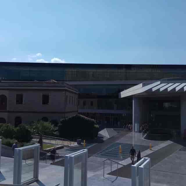 Acropolis Museum courtyard, modern architecture, ideal for site visits and outdoor receptions.
