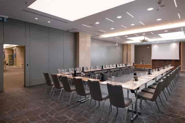 U-shaped meeting room at Crowne Plaza Athens, perfect for professional board meetings or conferences.