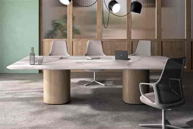 Minimalist executive boardroom with ergonomic seating for strategy sessions and corporate meetings.