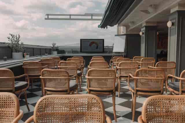Okra Acropolis rooftop workshop venue with theater seating for corporate events.