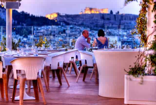 Hytra Athens rooftop restaurant, elegant corporate hospitality and luxury networking venue.