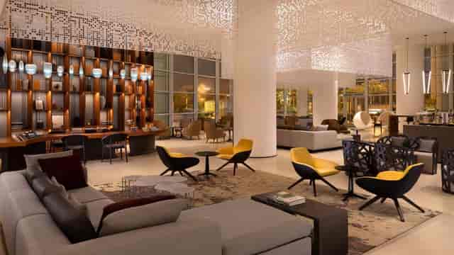 Modern Event Hall at Le Méridien Riyadh: sophisticated networking space for corporate conferences.