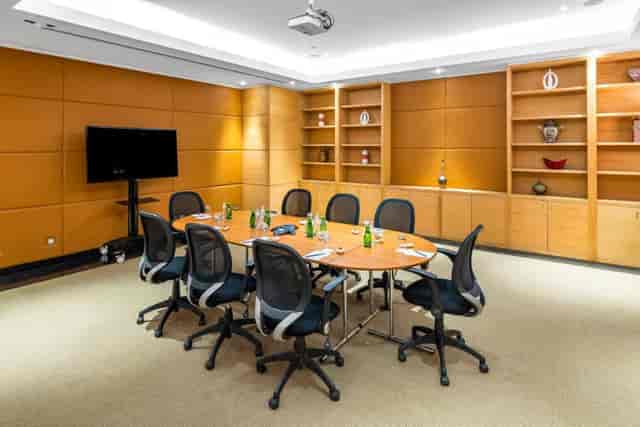 Boardroom at Radisson Blu Riyadh Al Sahafa for executive meetings and strategic planning.