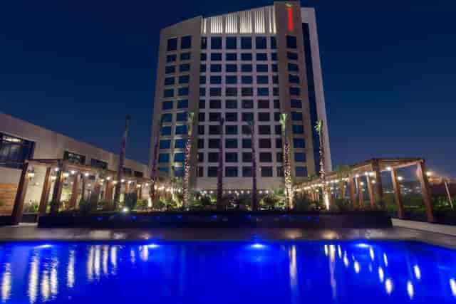 Illuminated pool deck at Mövenpick Riyadh, ideal for corporate networking and welcome cocktails.