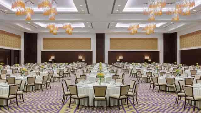 Pillarless banquet ballroom at JW Marriott Riyadh with geometric carpet for formal events.