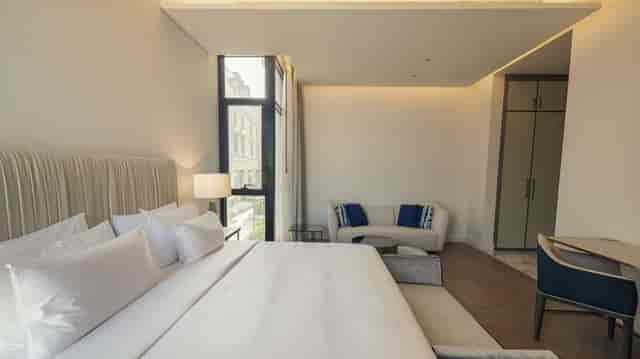 Luxury suite with seating area at Mansard Riyadh, ideal for VIP speakers and executive meetings.