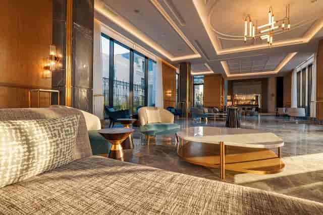 Upscale hotel lobby with residential seating for intimate networking and breakout sessions.