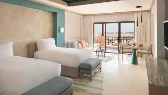 Grand Durrah premium double-queen room with balcony for executive retreats and incentive travel.