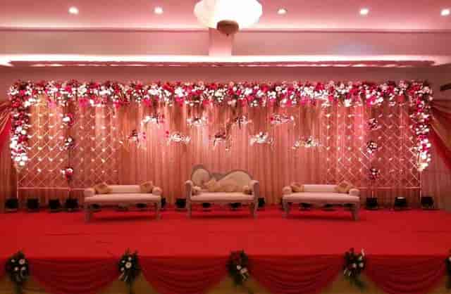 Wedding stage with floral arch at Lotus Restaurant, perfect for elegant wedding and banquet events.