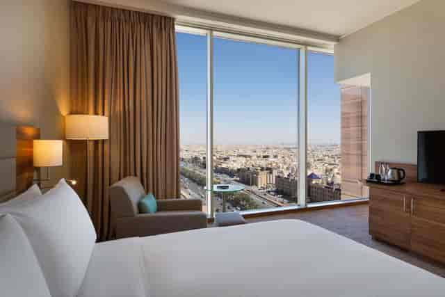 Hilton Garden Inn Riyadh meeting room with city views for corporate conferences and executive events.