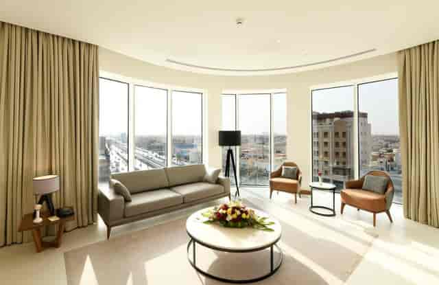 Executive suite at Hotel Golden Tulip Riyadh for professional board meetings and VIP interviews.