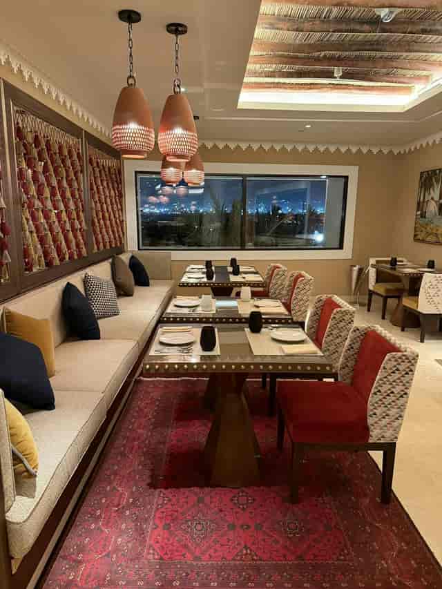Taleed by Michael Mina: Luxury VIP dinner setup with night views for upscale private events.