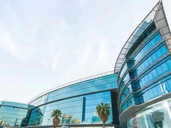 Modern glass meeting room in Al Akaria Plaza for corporate conferences and professional events.