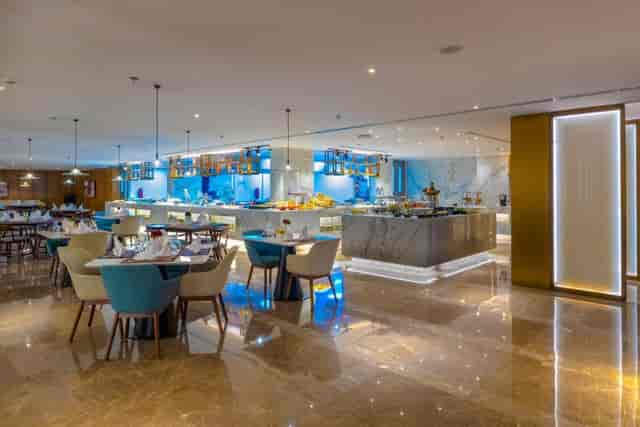 Modern Braira Al Wizarat meeting room with buffet, ideal for executive luncheons and networking.