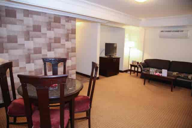 Tulip Inn Riyadh hotel suite, functional layout for business meetings and hospitality events.