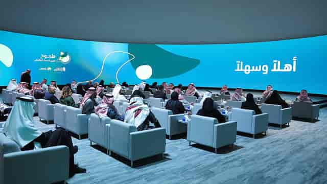 Executive lounge at Gheeras World with curved LED screen for premium corporate events.