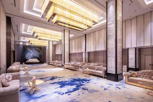 Luxury event pre-function lounge at Braira Al Nakheel Hotel with elegant tufted seating.