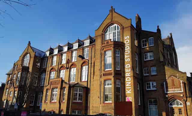 Historic Kindred Studios event space for corporate retreats and creative workshops.