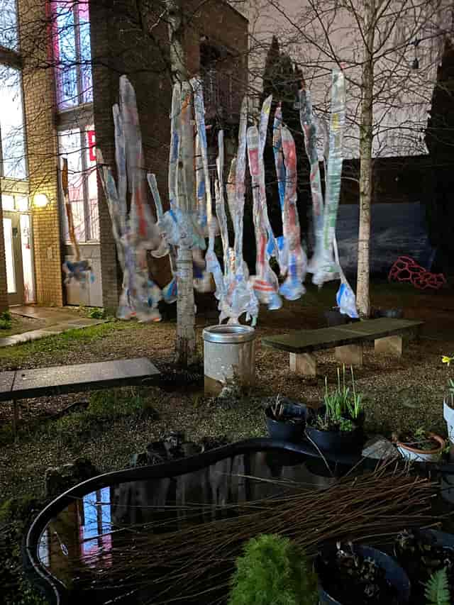 Experiential garden installation at Kindred Studios, DIY event decor and venue staging.