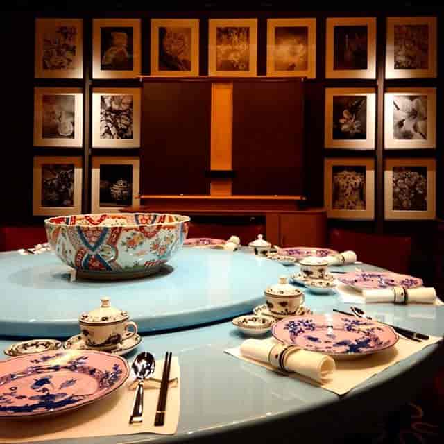 Luxury Garden Suite private dining room with traditional lazy Susan for corporate event hospitality.