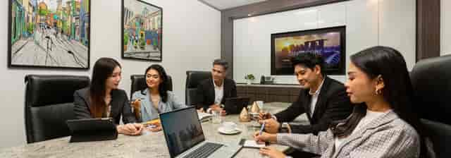 Modern Suntec City boardroom for executive breakout sessions and business meetings.
