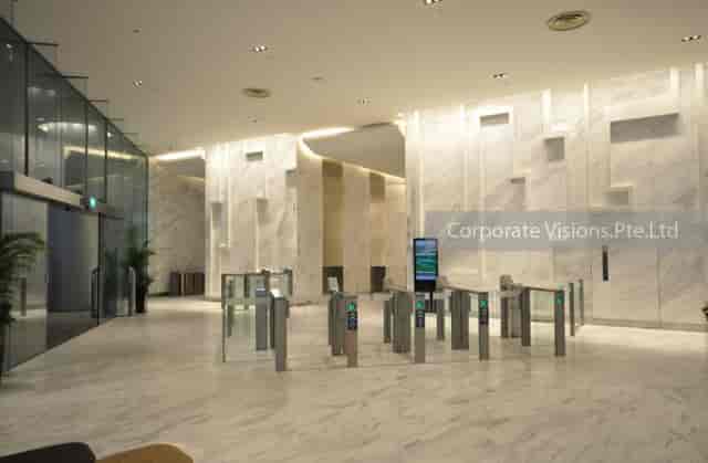 Minimalist corporate lobby at 20 Anson with access gates for professional event venue rental.