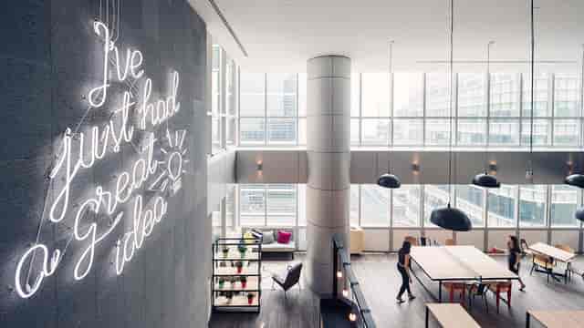 Modern breakout area at 120 Robinson Road, perfect for creative team meetings and collaboration.