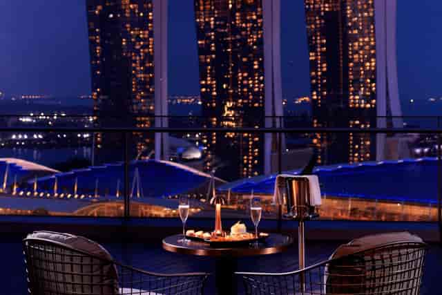 VIP rooftop bar event at Marina Bay Sands, premium networking venue with scenic terrace views.