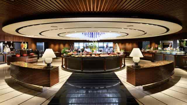 Luxury circular buffet in Conrad Singapore Orchard banquet hall for executive corporate events.