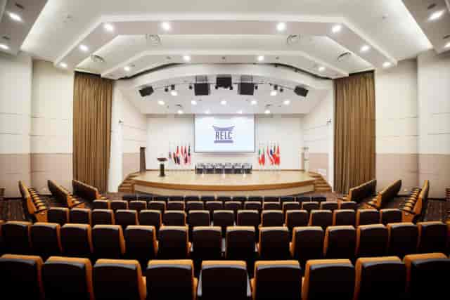 RELC International Hotel auditorium with stage for conferences and formal plenary events.