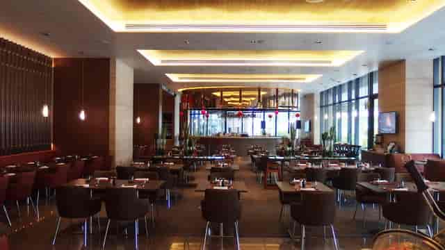 Modern Escape Restaurant at One Farrer Hotel, perfect for upscale corporate dinners and networking.