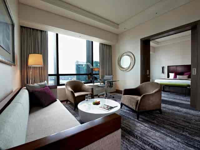 Carlton City Hotel executive suite with workspace for VIP meetings and corporate breakout sessions.