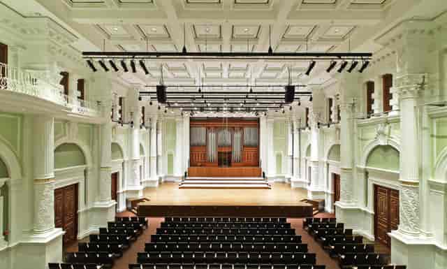 Victoria Concert Hall with stage and seating, ideal for corporate galas and keynote events.