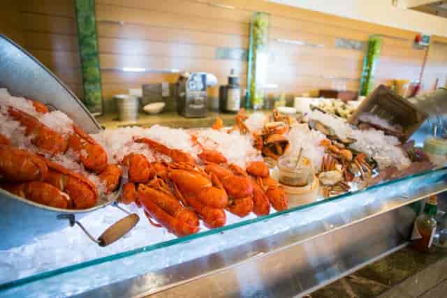 Premium seafood display at Seasonal Tastes buffet, luxury event catering centerpiece.