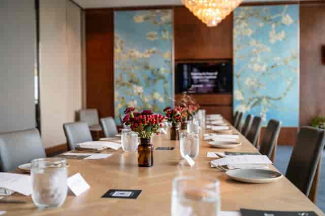 Luxury private dining room for executive meetings and corporate boardroom sessions.