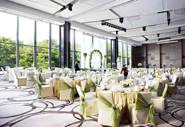 Modern Grand Ballroom with floor-to-ceiling windows for corporate galas and wedding receptions.