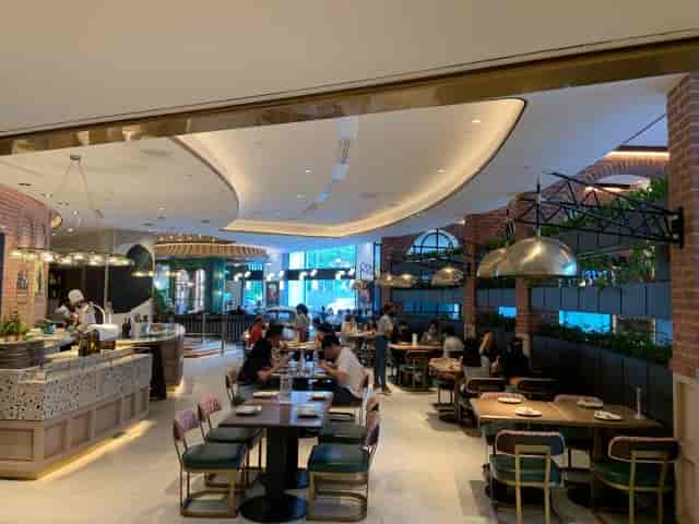 Prego restaurant interior with bar and flexible seating for business networking and F&B events.